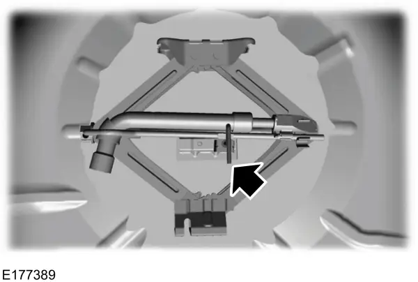 De autokrik en de wielmoersleutel uitnemen en opbergen